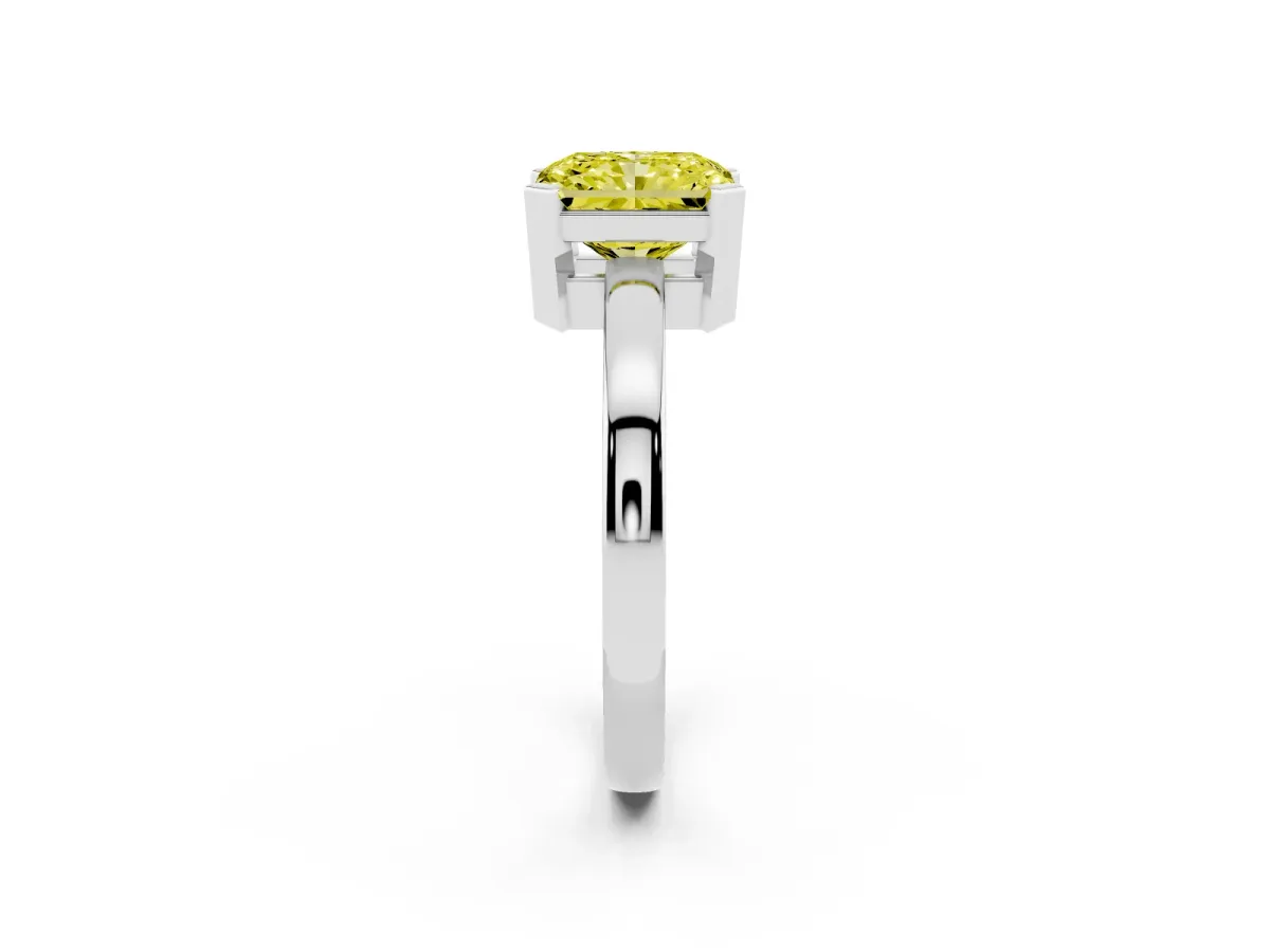Fancy Yellow Radiant Cut Cut Solitaire Ring with Four-Prong Setting and Classic Band Silver