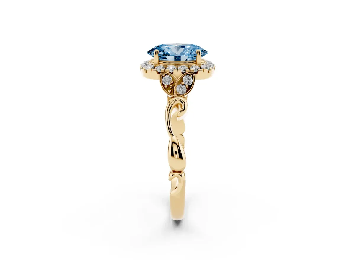 Fancy Blue Oval Cut Halo Diamond Engagement Ring with Vintage-Inspired Band and Four-Prong Setting Yellow gold