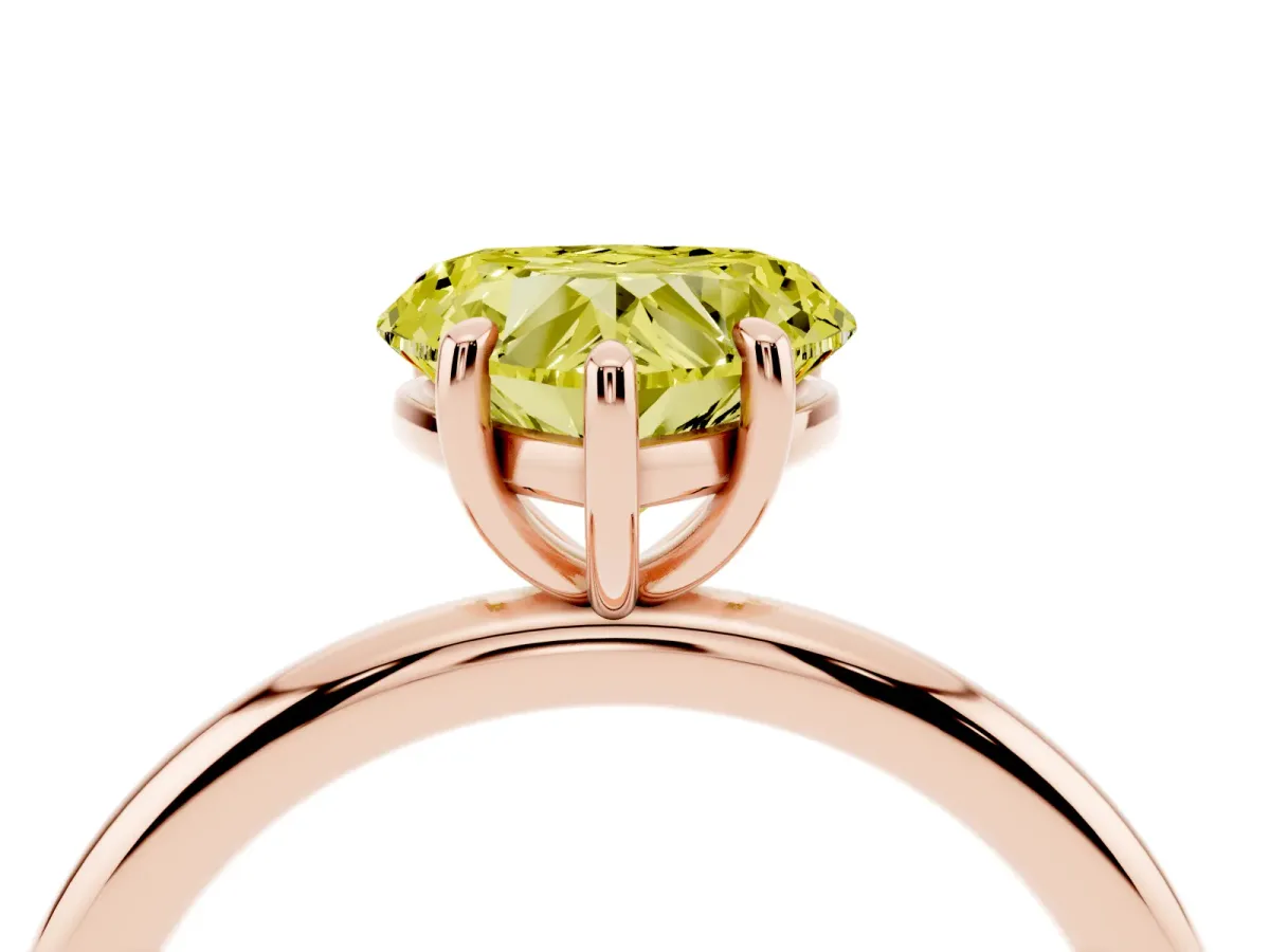 Fancy Yellow Heart Cut Solitaire Diamond Ring with Four-Prong Setting on a Plain Band Rose gold