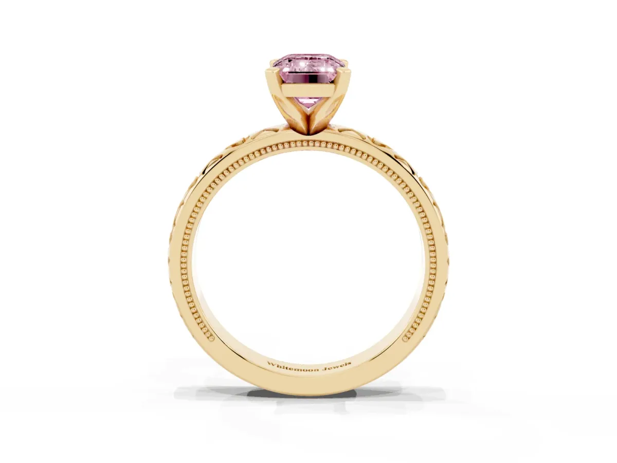 Fancy Pink Emerald Cut Solitaire Diamond Engagement Ring with XO Engraved Band and Four-Prong Setting Yellow gold