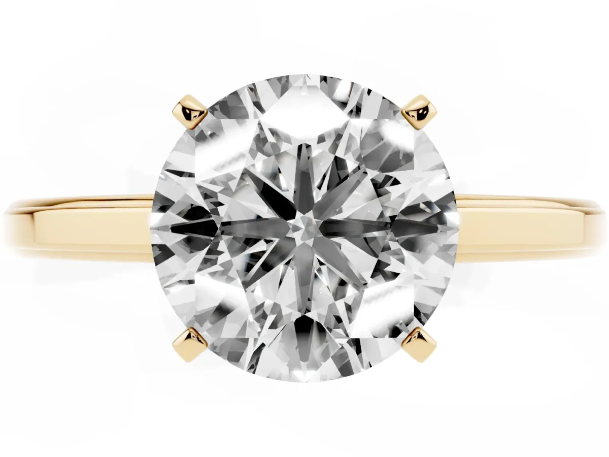 Round Cut Solitaire Diamond Ring with Four-Prong Setting and Classic Band Yellow gold