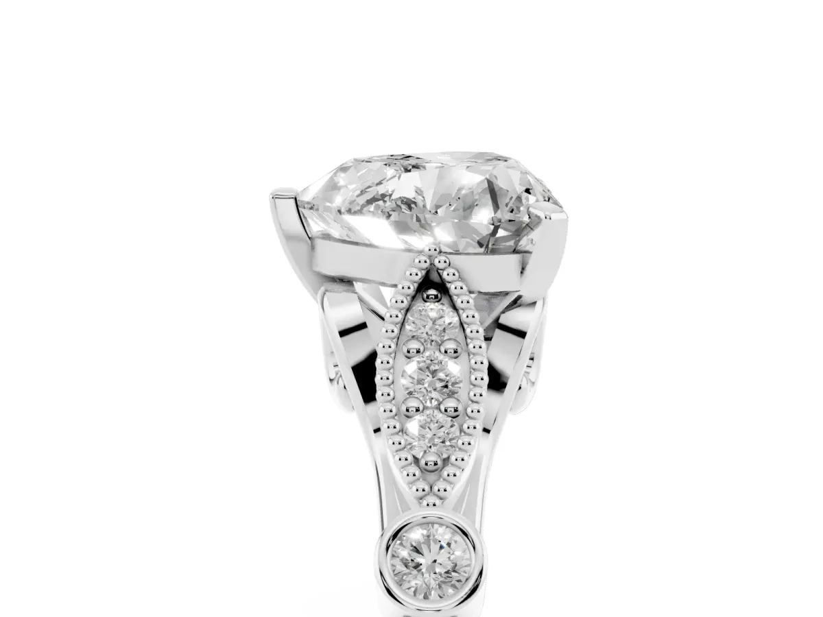 Heart Cut Cut Diamond with Milgrain Marquise and Bezel Accents on a Solitaire Band with Prong Setting Platinum