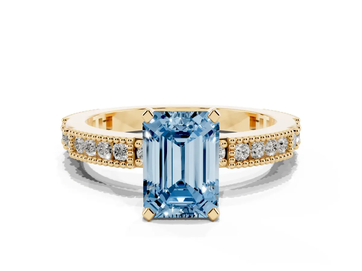 Fancy Blue Emerald Cut Solitaire with Pavé Band and Four-Prong Setting Yellow gold