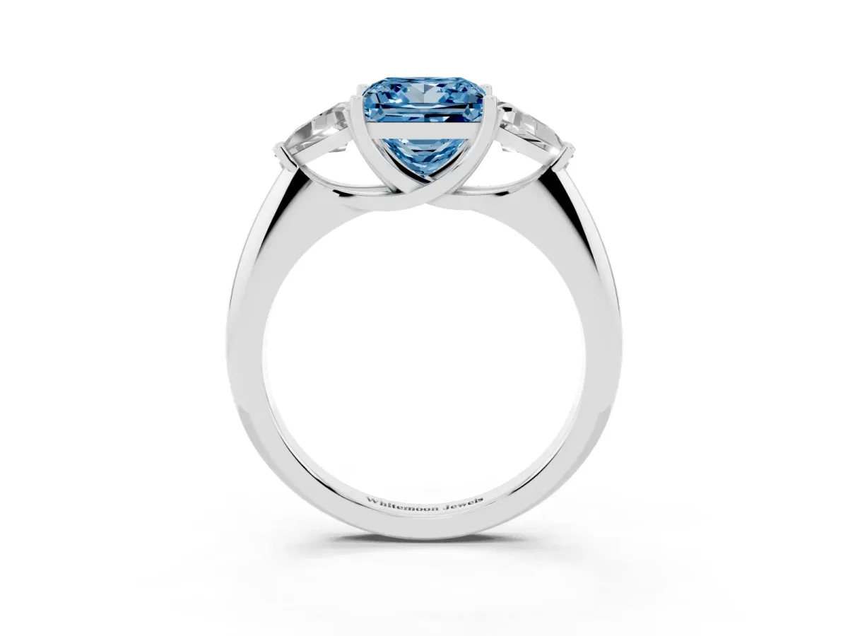 Fancy Blue Three-Stone Princess Cut Diamond Engagement Ring with Trillion Side Stones and Prong Setting Silver
