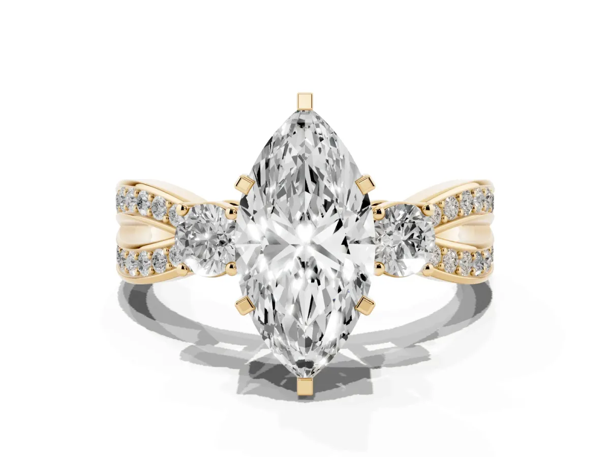 Three-Stone Marquise Cut Cut Diamond Twist Band with Prong Setting Yellow gold