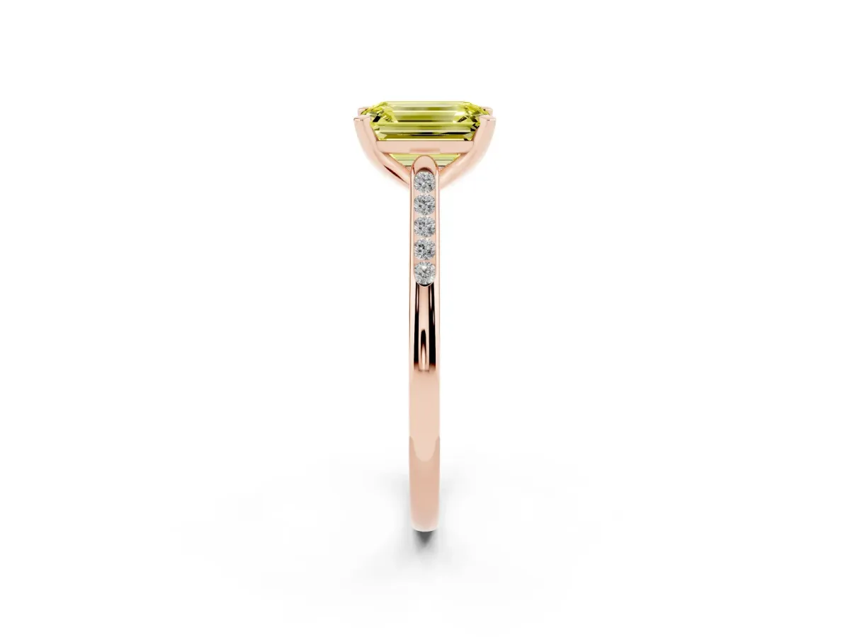 Fancy Yellow Emerald Cut Diamond Solitaire Ring with Channel Set Round Band and Prong Setting Rose gold