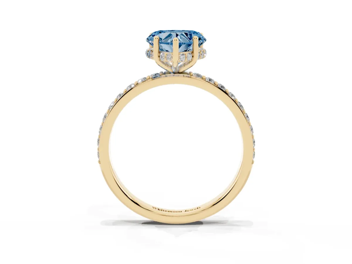 Fancy Blue Heart Cut Diamond Solitaire Ring with Pavé Band and Hidden Halo Yellow gold