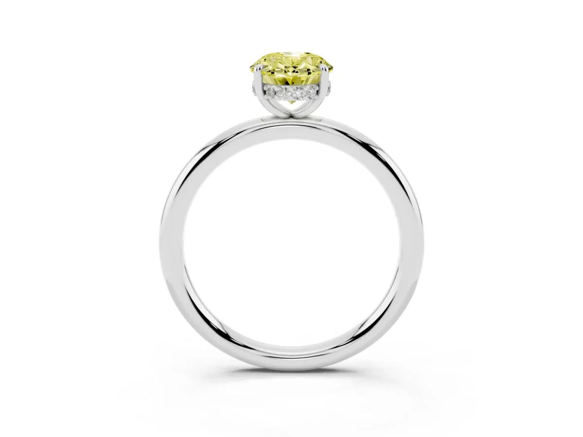 Fancy Yellow Oval Cut Diamond Solitaire Ring with Thin Band and Four-Prong Setting Silver