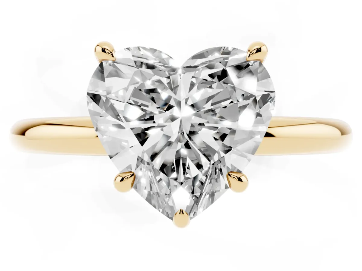 Heart Cut Diamond Solitaire Ring with Thin Band and Four-Prong Setting Yellow gold