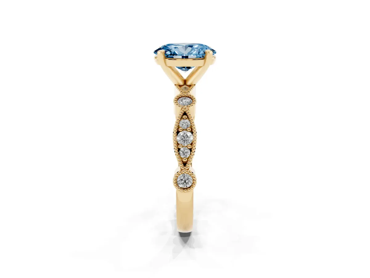 Fancy Blue Oval Cut Milgrain Bezel Diamond Engagement Ring with Solitaire Prong Setting Yellow gold
