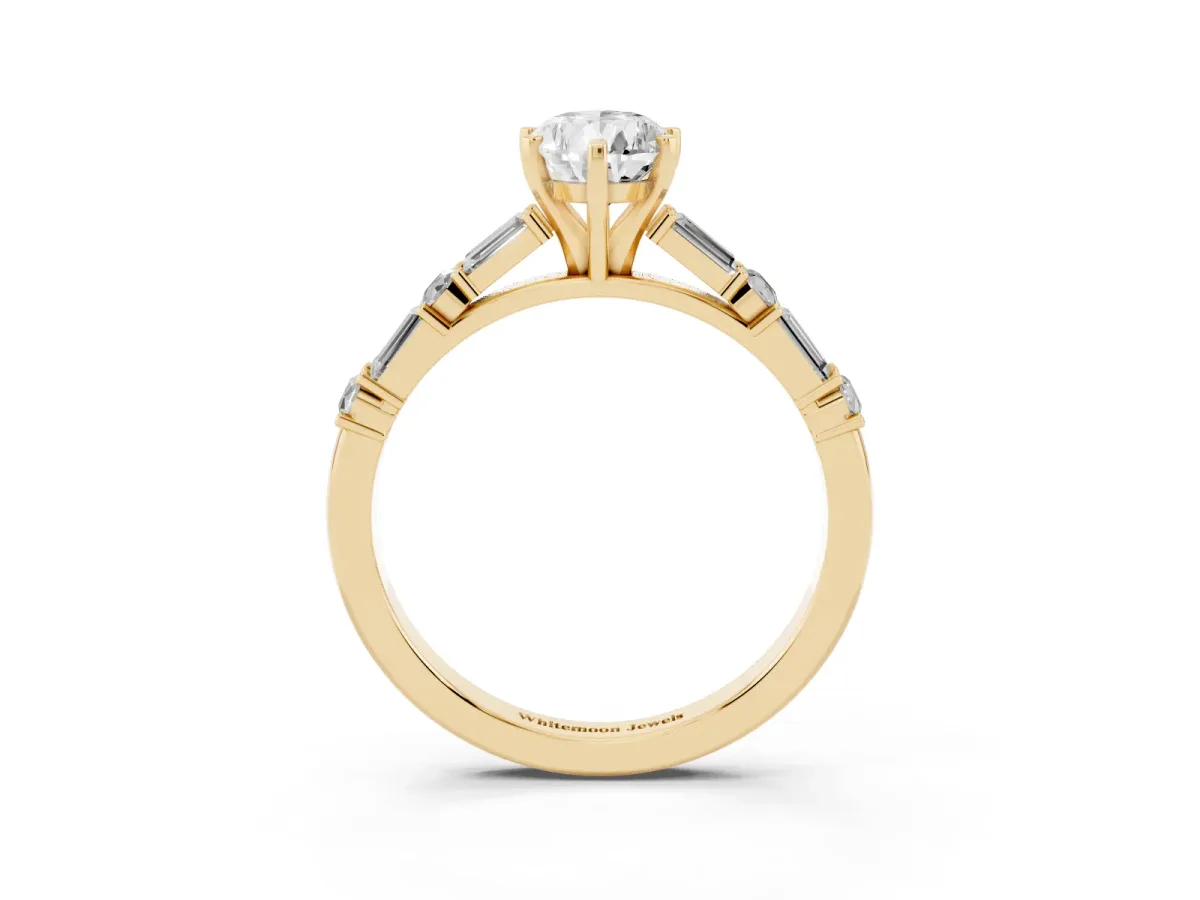 Pear Cut Diamond Solitaire with Side Baguettes and Channel Set Band Yellow gold