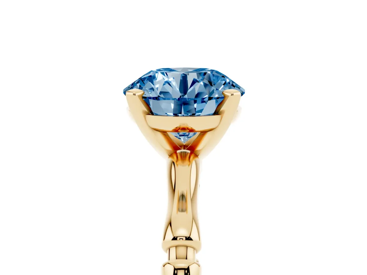 Fancy Blue Round Cut Solitaire Diamond Ring with Bamboo Band and Four-Prong Setting Yellow gold