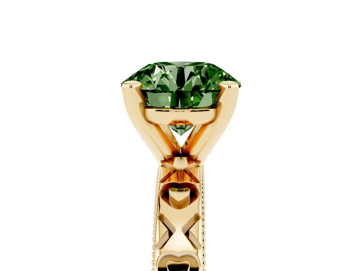Fancy Green Round Cut Solitaire Diamond Engagement Ring with XO Engraved Band and Four-Prong Setting Yellow gold