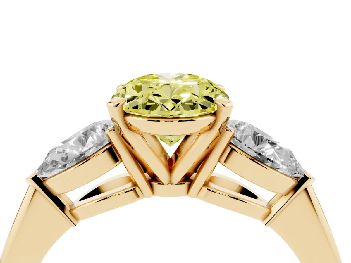 Fancy Yellow Three-Stone Oval Cut Diamond Ring with Pear Side Stones and Four-Prong Setting Yellow gold