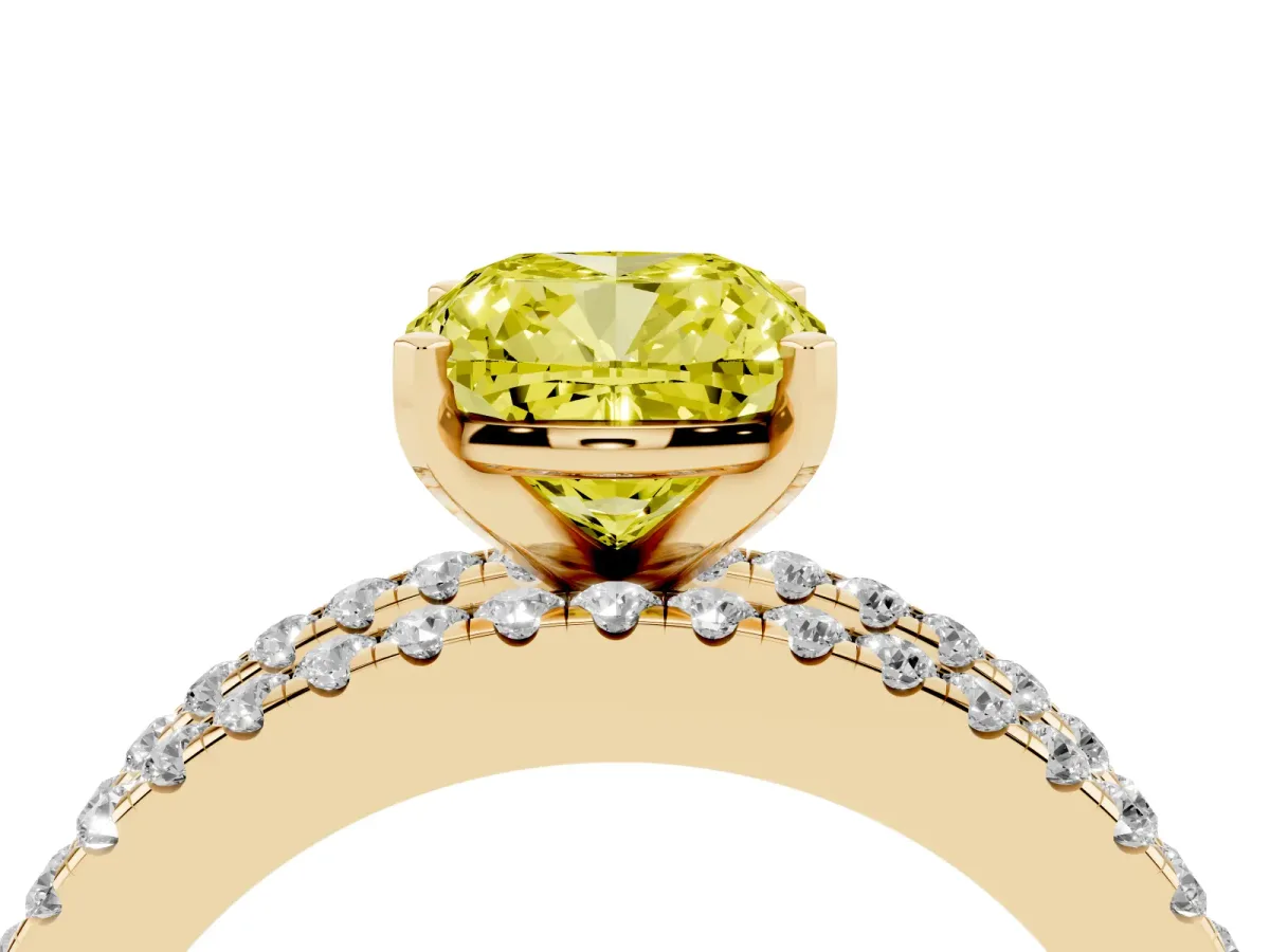 Fancy Yellow Cushion Cut Diamond Solitaire Ring with Pavé and Channel Set Band Yellow gold