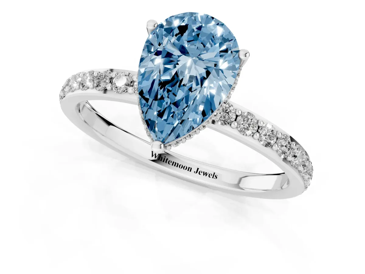 Fancy Blue Pear Cut Diamond Solitaire Ring with Pavé Band and Hidden Halo Silver