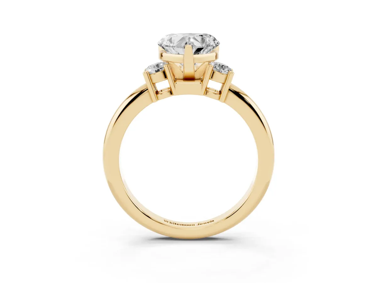 Three-Stone Heart Cut Cut Diamond Solitaire with Prong Setting and Classic Band Yellow gold