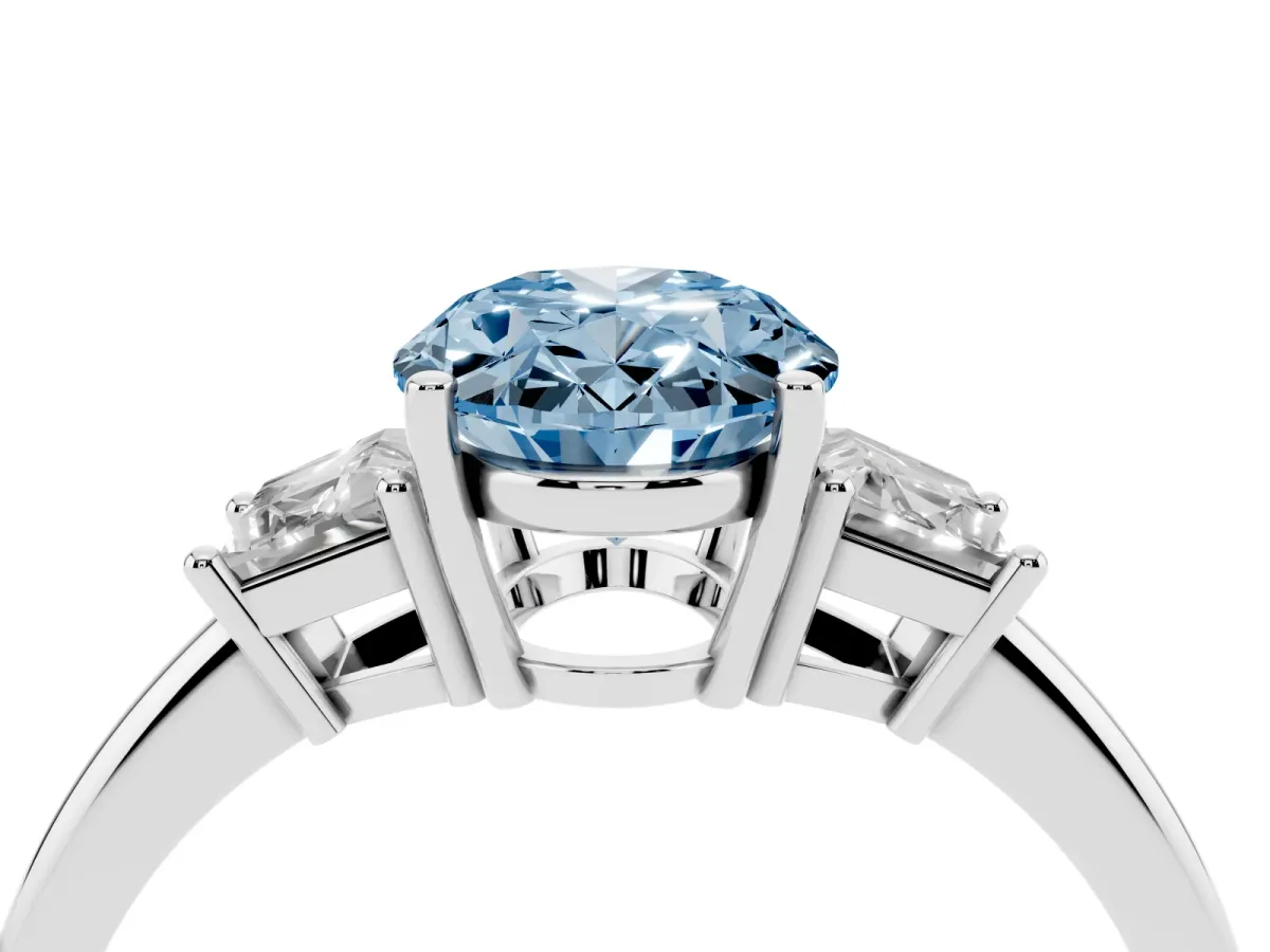 Fancy Blue Oval Cut Diamond Three-Stone Ring with Trapezoid Side Stones and Prong Setting Silver