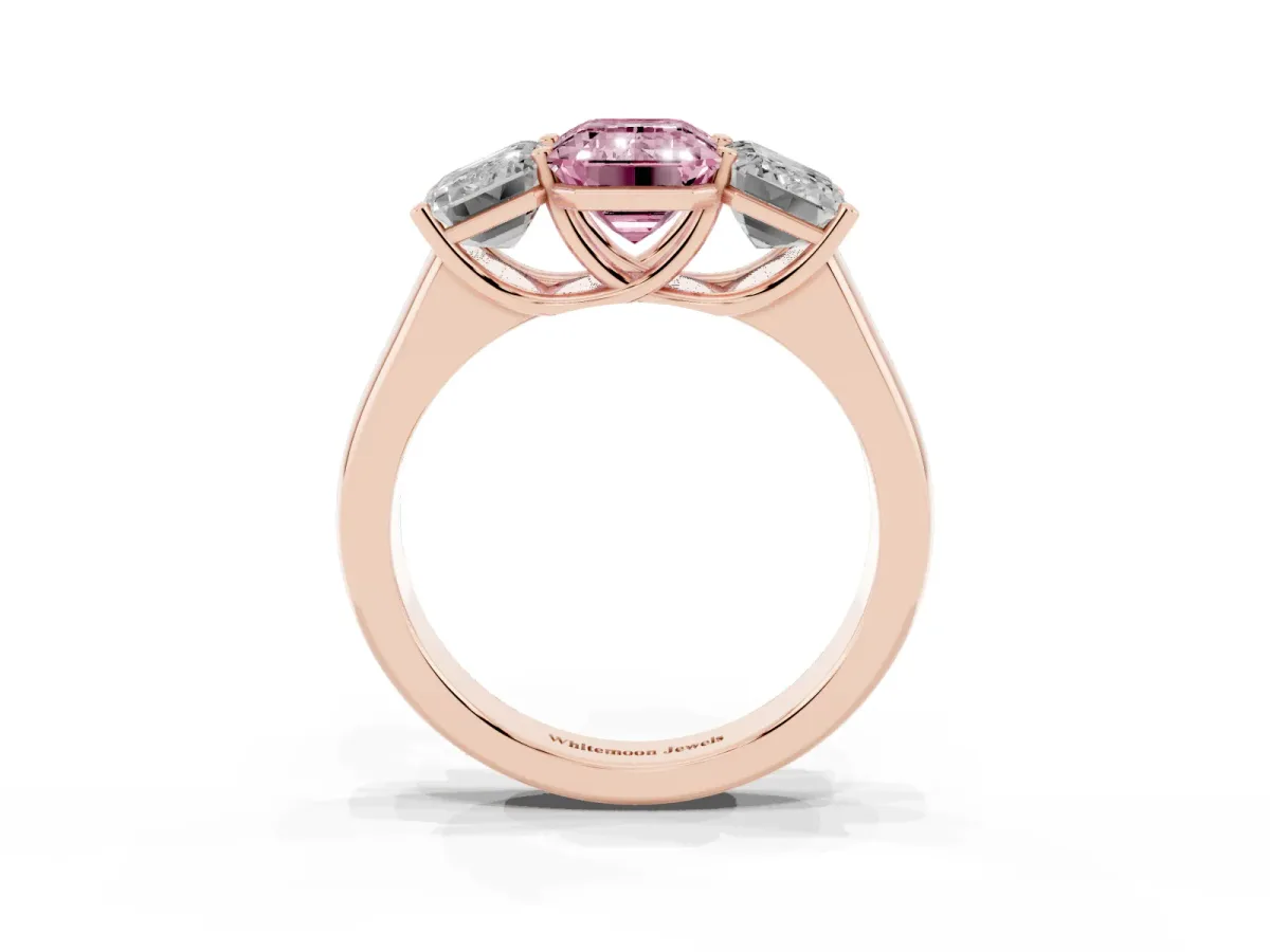 Fancy Pink Emerald Cut Three-Stone Diamond Ring with Prong Setting on a Classic Band Rose gold