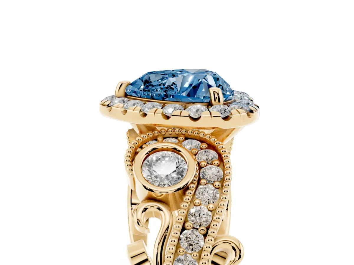 Fancy Blue Heart Cut Halo Diamond Ring with Milgrain and Bezel Accents on a Split Shank Band Yellow gold