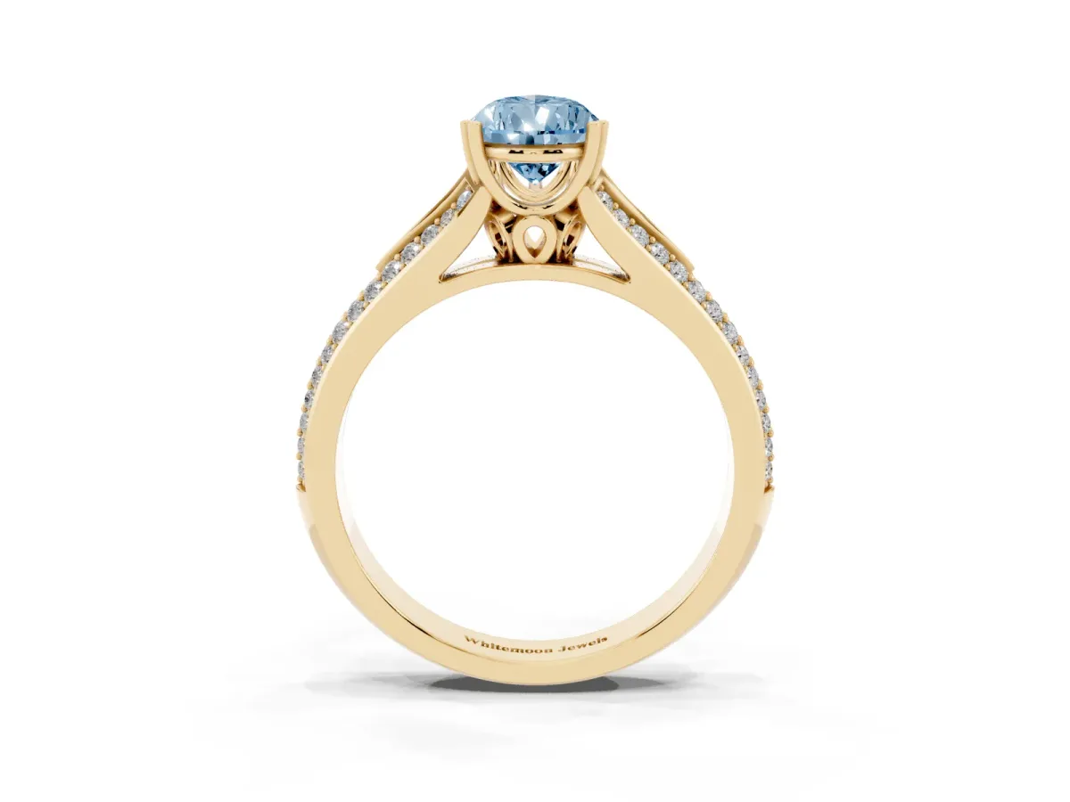 Fancy Blue Pear Cut Diamond Split Shank Engagement Ring with Pavé Band Yellow gold