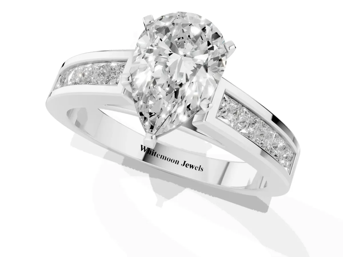 Pear Cut Solitaire Diamond Ring with Channel-Set Band and Four-Prong Setting Silver