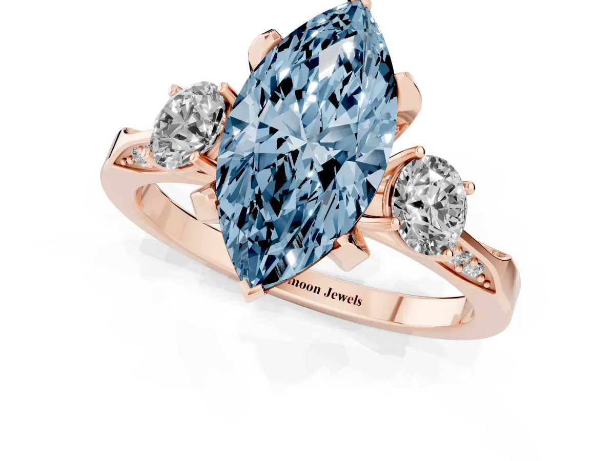 Fancy Blue Marquise Cut Brilliant Three-Stone Diamond Ring with Pavé Band and Four-Prong Setting Rose gold