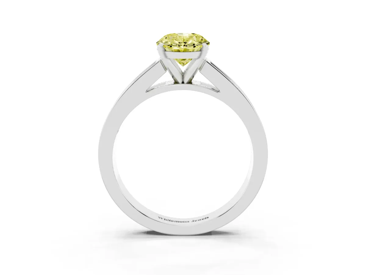 Fancy Yellow Oval Cut Solitaire Diamond Ring with Channel-Set Band and Four-Prong Setting Silver