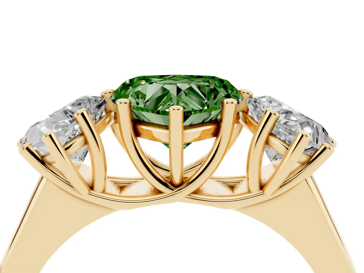 Fancy Green Heart Cut Three-Stone Diamond Ring with Prong Setting on a Classic Band Yellow gold
