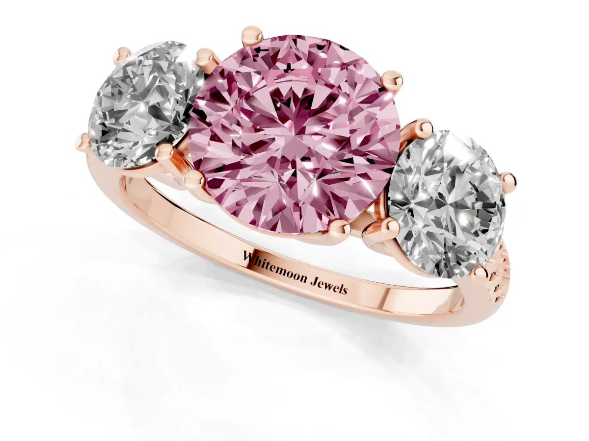 Fancy Pink Three-Stone Round Cut Diamond Ring with Round Pavé Band and Prong Setting Rose gold