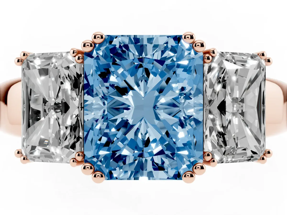 Fancy Blue Three-Stone Radiant Cut Cut Diamond Ring with Channel Set Band and Four-Prong Setting Rose gold