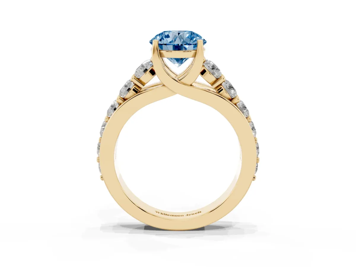 Fancy Blue Round Cut Diamond Engagement Ring with Pavé Band and Four-Prong Setting Yellow gold