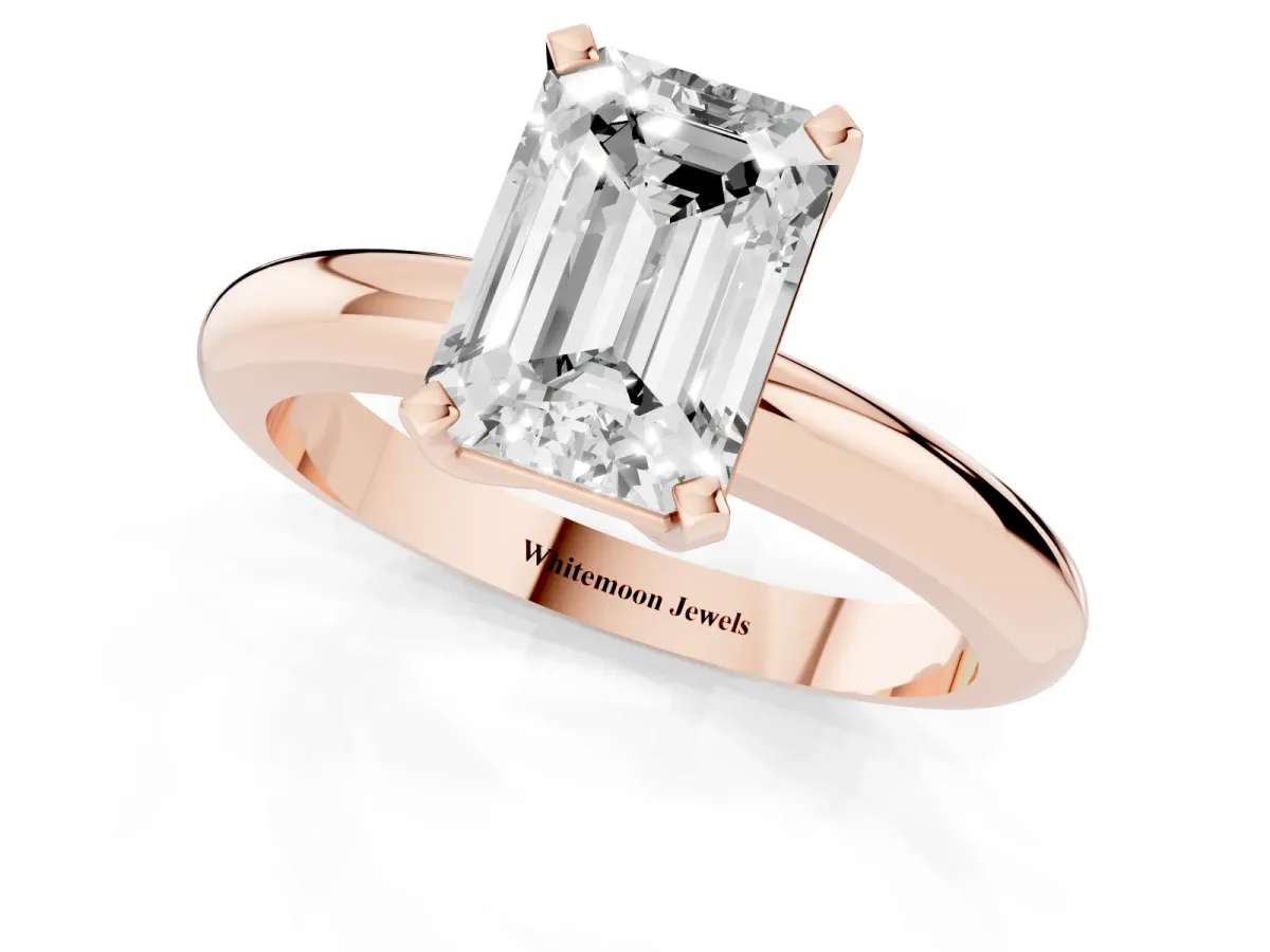 Emerald Cut Diamond Solitaire Engagement Ring with Round Band and Four-Prong Setting Rose gold