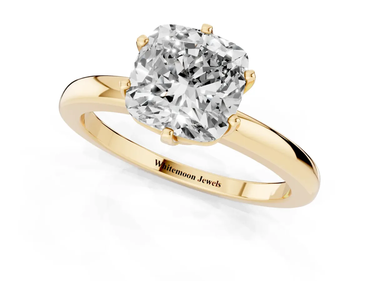 Cushion Cut Solitaire Diamond Ring with Six-Prong Setting on a Classic Band Yellow gold