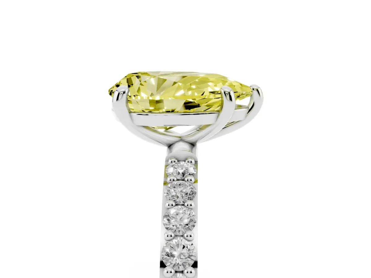 Fancy Yellow Pear Cut Diamond Solitaire Ring with Round Pavé Band and Prong Setting Silver