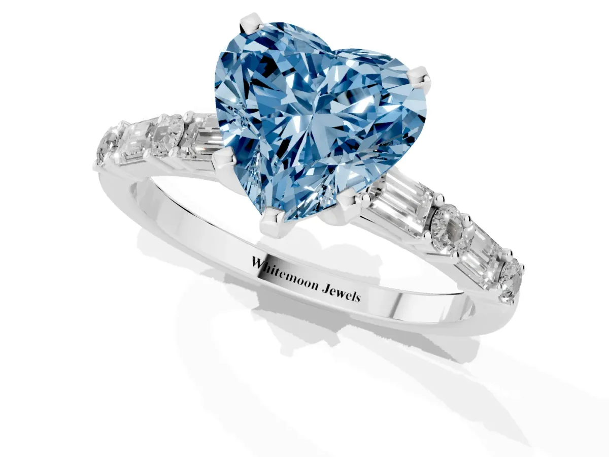 Fancy Blue Heart Cut Diamond Solitaire with Side Baguettes and Channel Set Band Silver