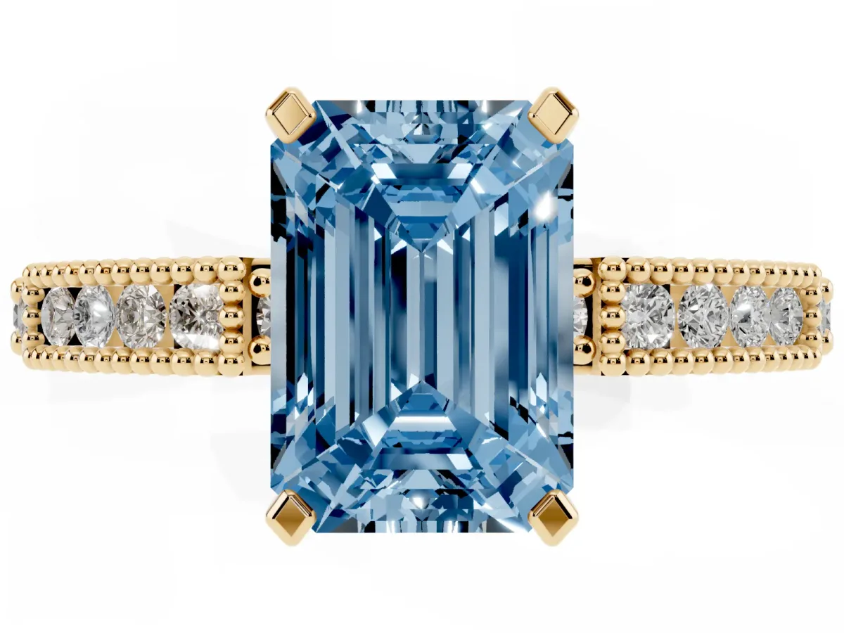 Fancy Blue Emerald Cut Solitaire with Pavé Band and Four-Prong Setting Yellow gold