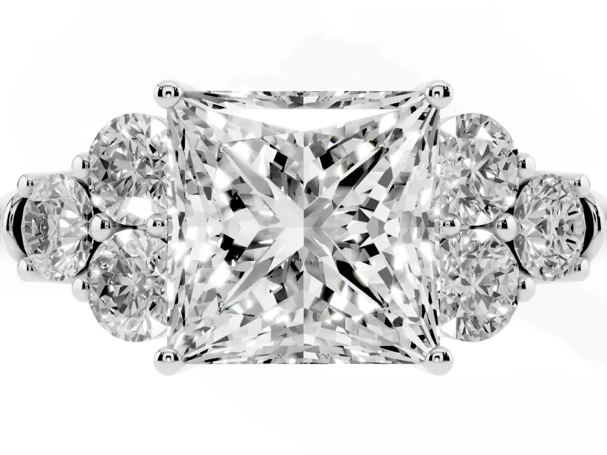 Princess Cut Cut Diamond Cluster Ring with Round Accent Stones and Prong Setting on a Classic Band White gold