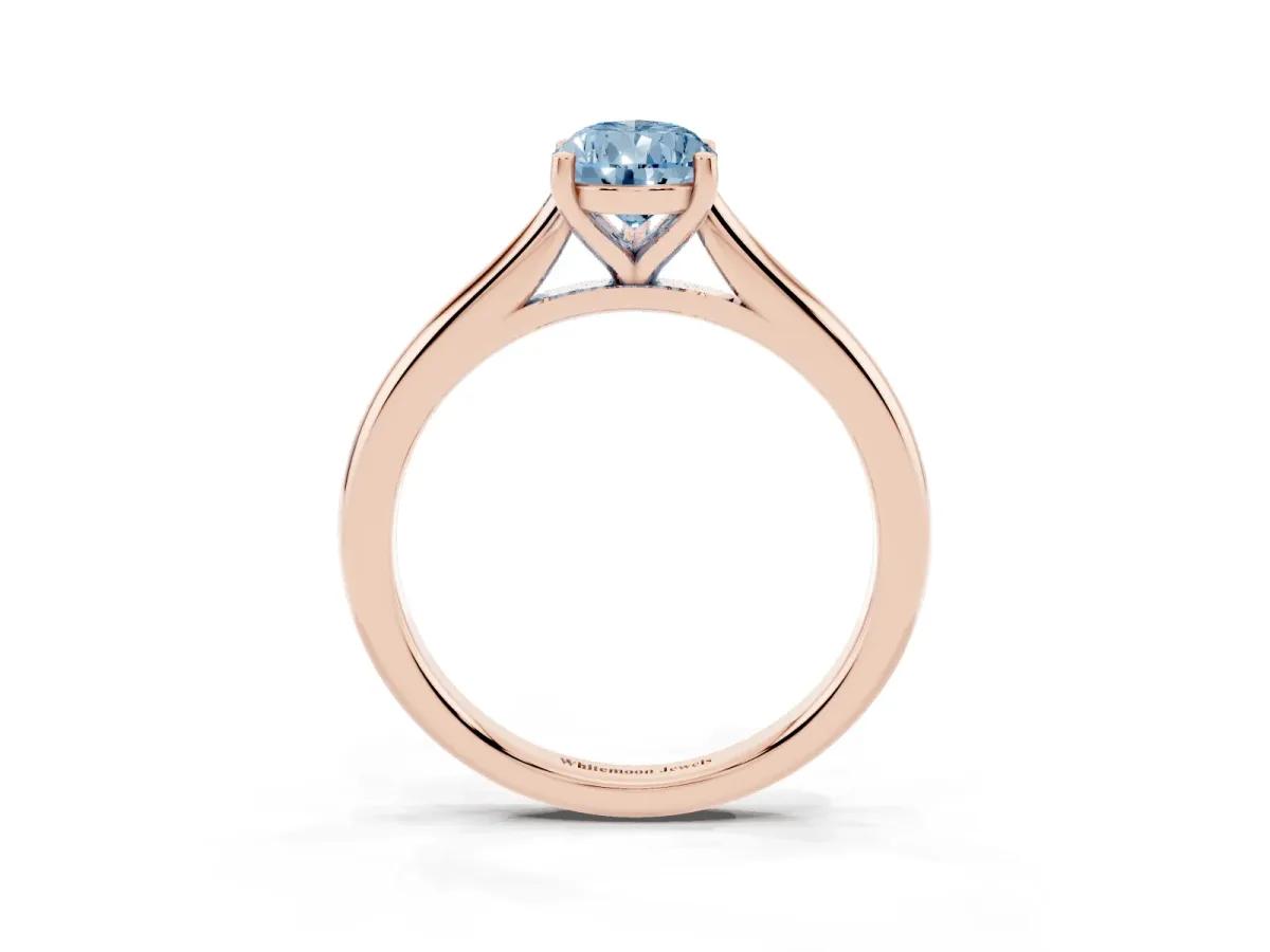 Fancy Blue Pear Cut Cut Solitaire Ring with Cathedral Band and Four-Prong Setting Rose gold