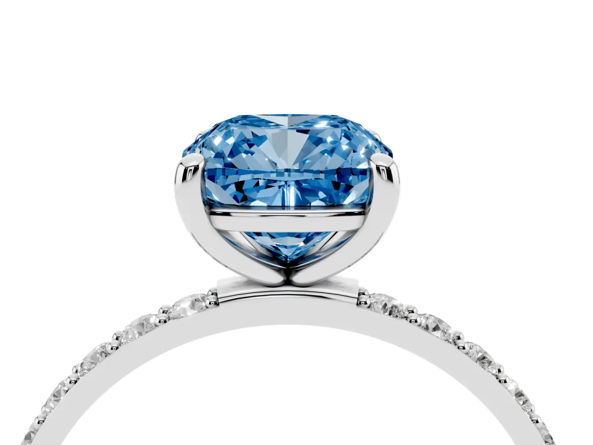 Fancy Blue Cushion Cut Diamond Solitaire Ring with Round Pavé Band and Prong Setting Silver