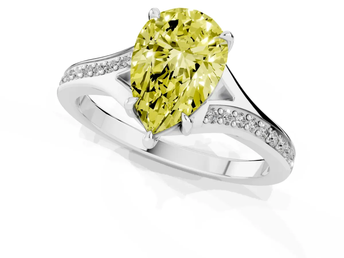 Fancy Yellow Pear Cut Diamond Solitaire Ring with Pavé Band and Prong Setting Silver
