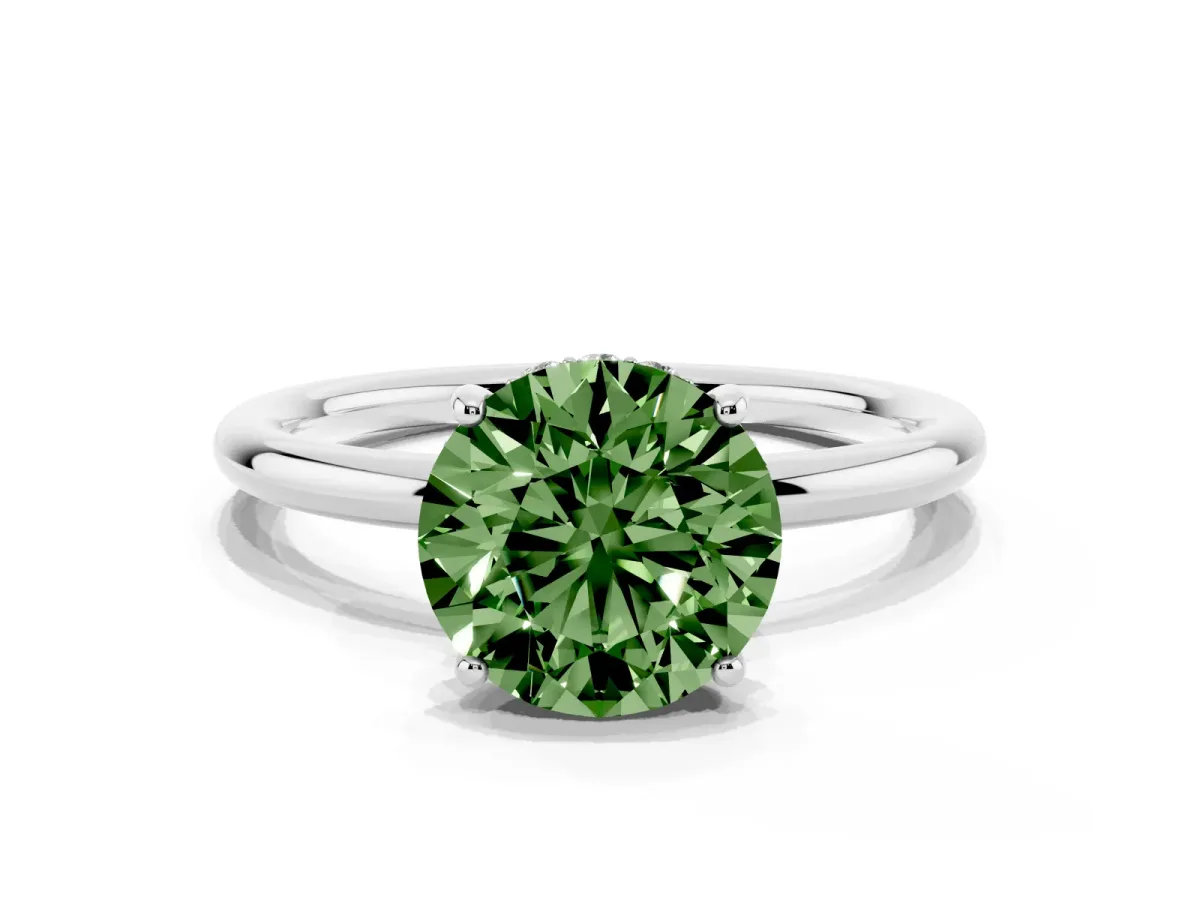 Fancy Green Round Cut Solitaire Diamond Ring with a Classic Band and Four-Prong Setting Silver