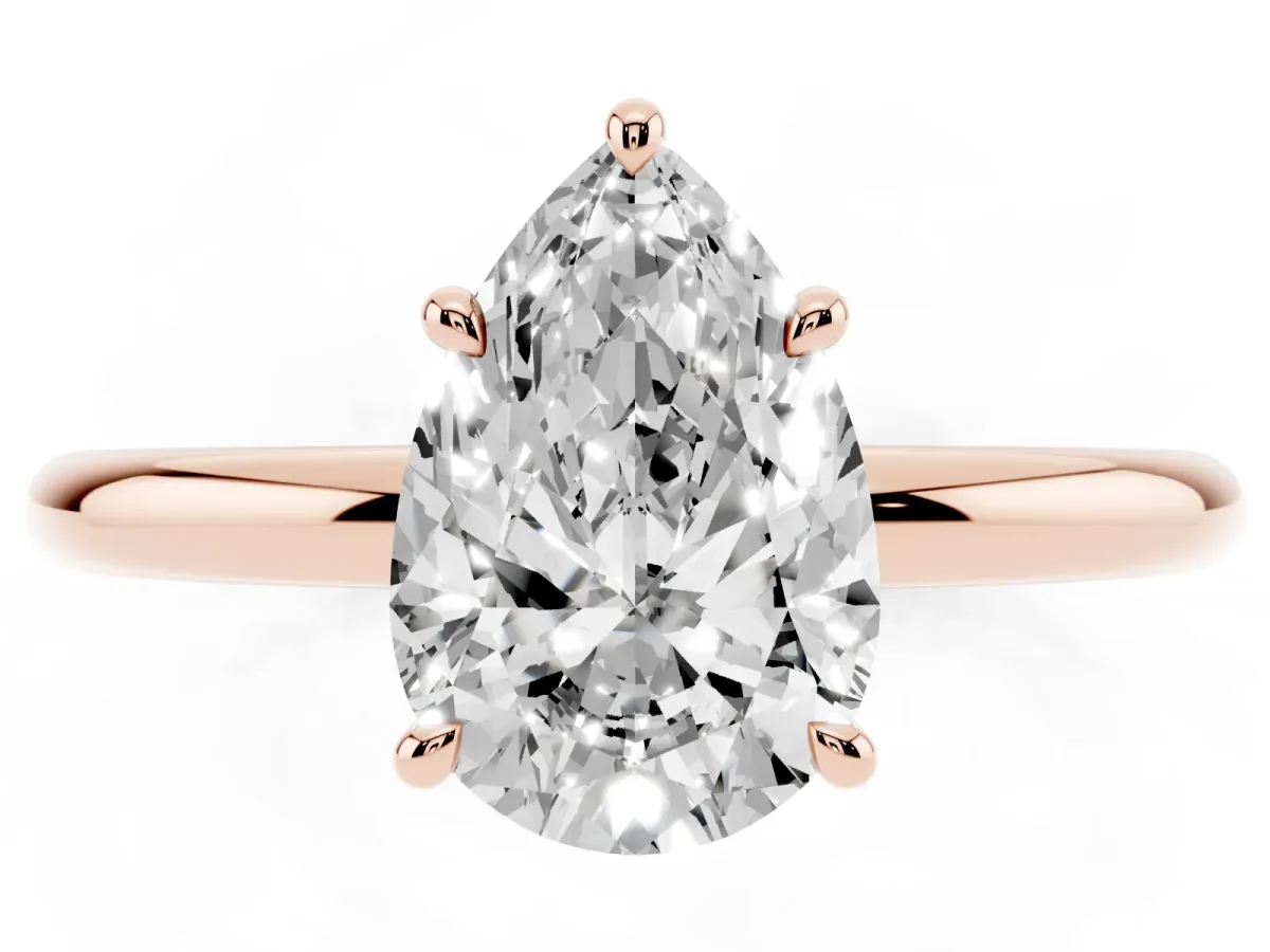 Pear Cut Diamond Solitaire Ring with Thin Band and Four-Prong Setting Rose gold