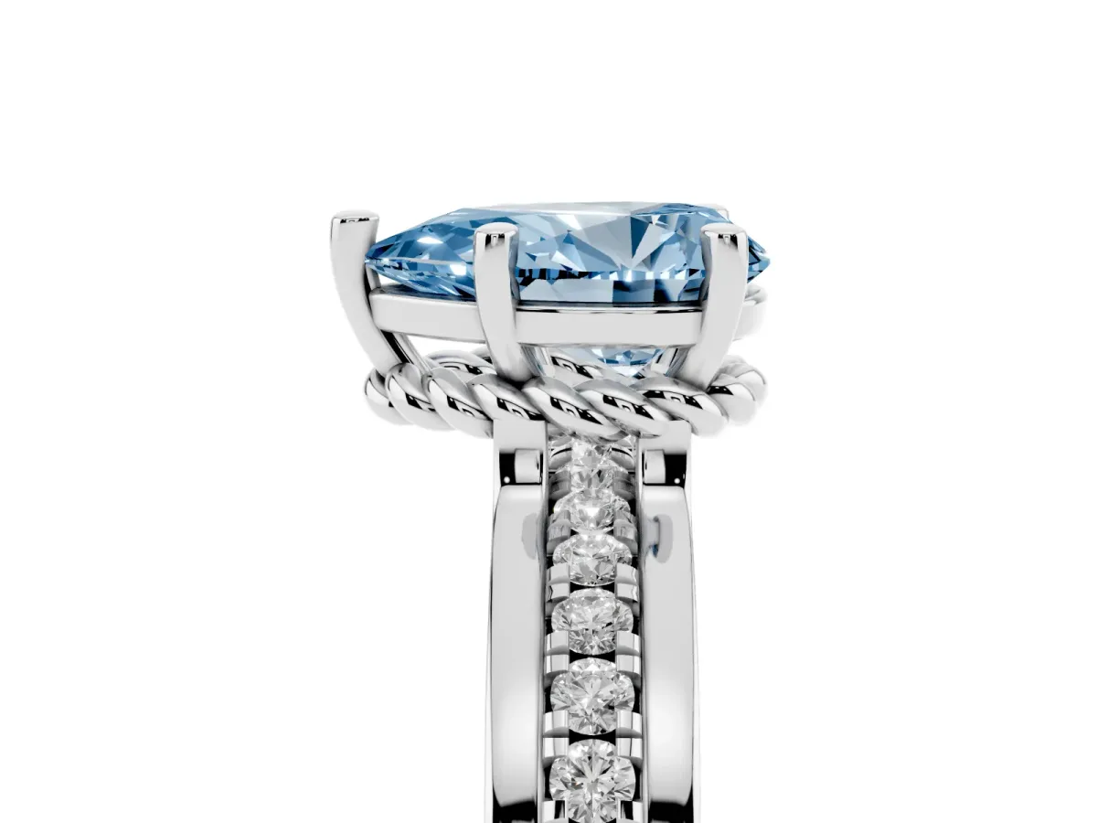 Fancy Blue Pear Cut Solitaire Diamond Ring with Channel Set Band and Six-Prong Setting Silver
