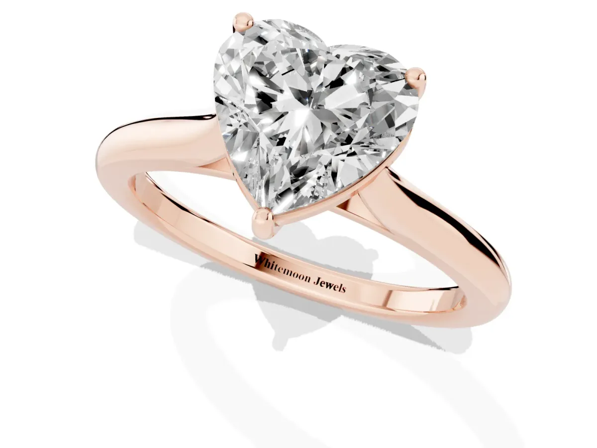 Heart Cut Cut Solitaire Ring with Cathedral Band and Four-Prong Setting Rose gold