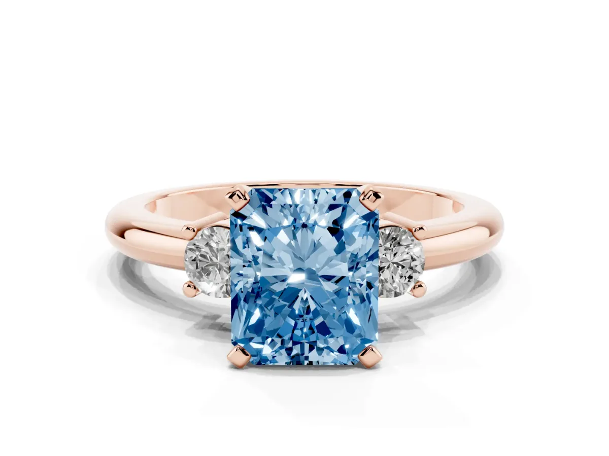 Fancy Blue Three-Stone Radiant Cut Cut Diamond Solitaire with Prong Setting and Classic Band Rose gold
