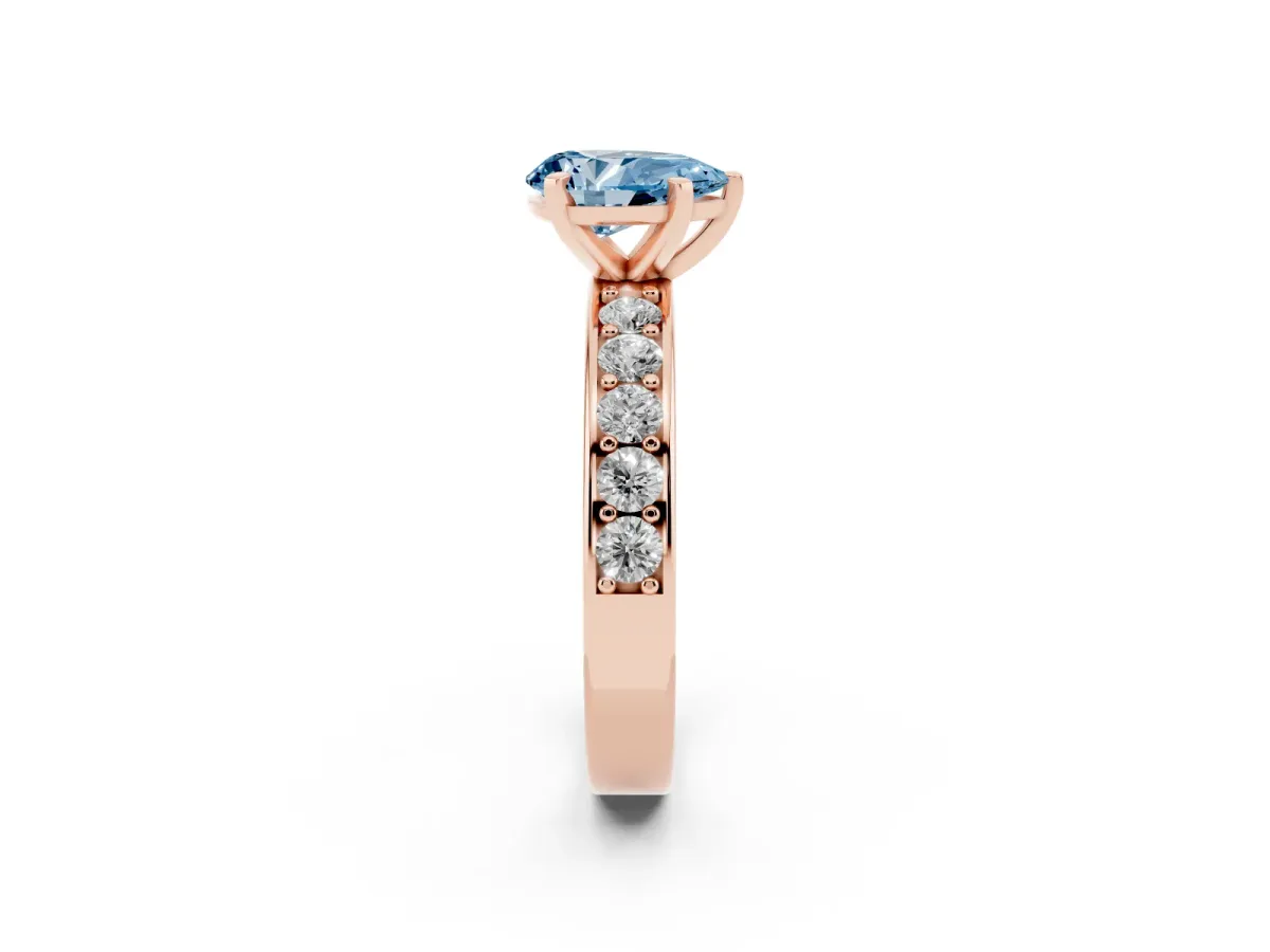 Fancy Blue Pear Cut Diamond Engagement Ring with Channel Set Round Band and Prong Setting Rose gold