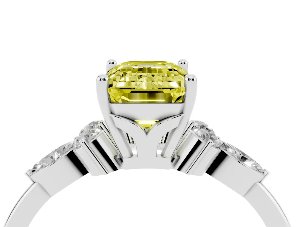 Fancy Yellow Emerald Cut Brilliant Diamond Solitaire Ring with Pear Side Stones and Four-Prong Setting White gold