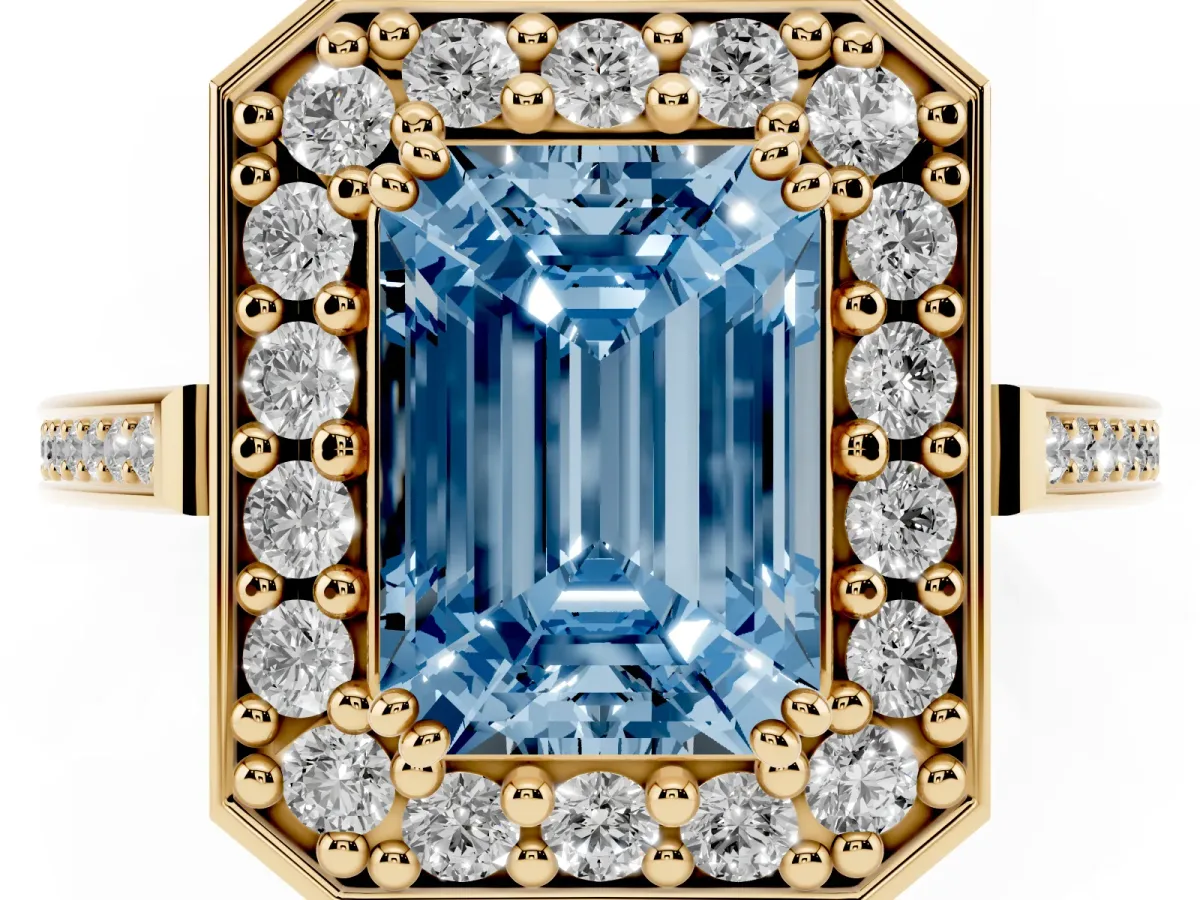 Fancy Blue Emerald Cut Diamond Halo Ring with Split Shank and Four-Prong Setting Yellow gold