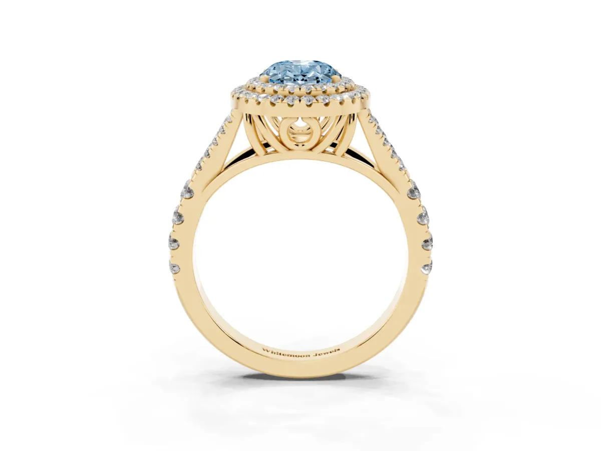 Fancy Blue Double Halo Oval Cut Diamond Split Shank Engagement Ring with Four-Prong Setting Yellow gold